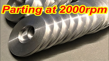 Small CNC lathe parting with close ups of chip shape