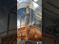 Let's take a look at the conveyor belt feeding into the mixer #machine #automobile #manufacturing