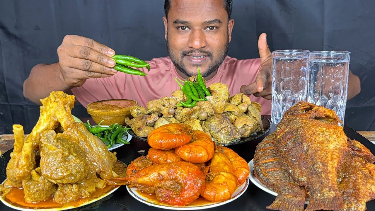 spicy mutton curry, egg curry, prawns masala curry, full fish fry and chicken liver with rice eating