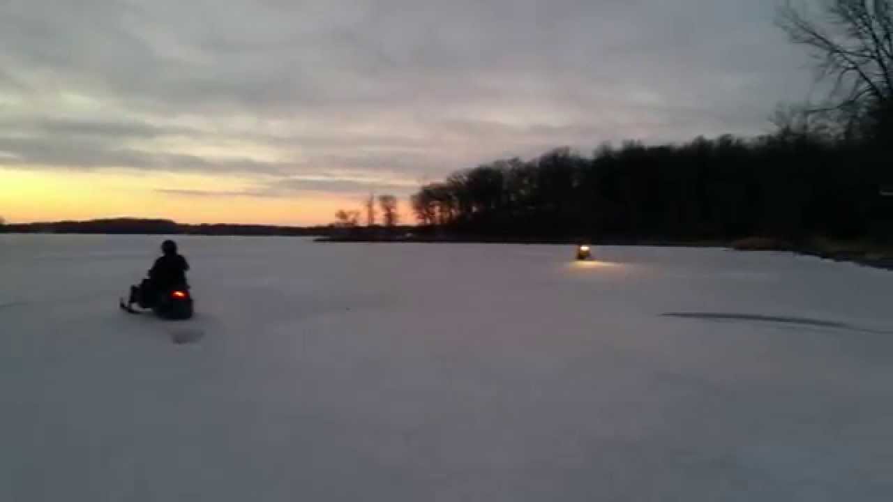 Snowmobiling on lake in MN YouTube