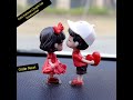 Cute Cartoon Couple Car Accessories – Kissing Doll with Balloon Ornaments.