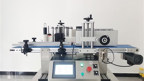 YTK-150 round bottle labeling machine in PVC belt conveyor