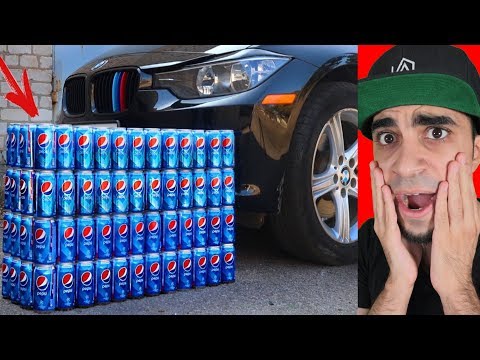 سيارة تدعس على 100 علبة بيبسي