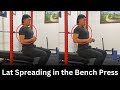 Lat spreading for a better bench press brace