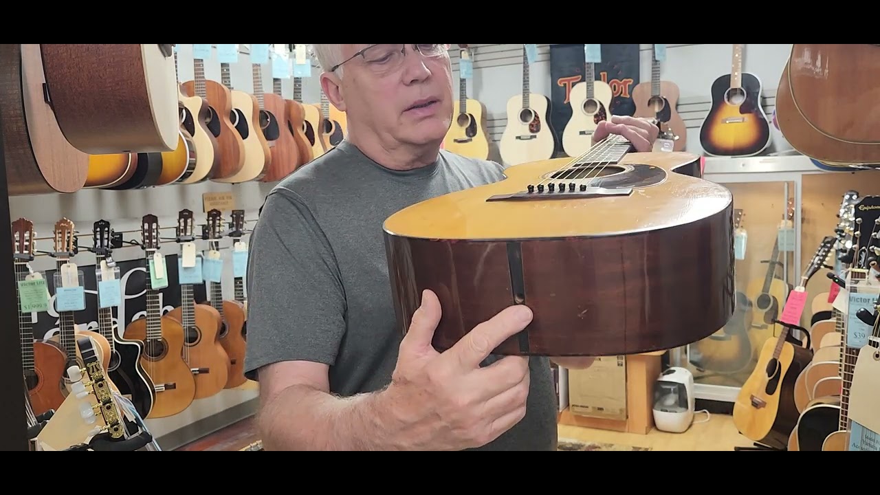 Vintage antique Martin guitars and a mandolin from as old as 1940s