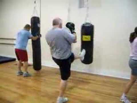 Kick-boxing class is a cardio class with emphasis on fighting. The class is located at Princeton Fitness in Princeton, Indiana (Gibson County). There are 4 bags hanging! No sparring required, but available if requested. No experience necessary. Cost: $5 members, $10 non-members. Pictured are Jeremy Schatz (long body bag), Mike Jones (middle bag) and Gina Jones.Princeton Fitness 24 / 7 fitness 24 / 7 tanning New incline treadmills go up to an INSANE 30 degrees! Smith Machine, Power Rack, Cross over Cable Station PF is huge- it spans 2 buildings on the historic town square in Princeton, Indiana (Gibson County). Owned/ operated by Jennifer, a local business owner. 9000 square feet & 4 floors of space- cardio, tons of free weights, benches, Sprint Circuit machines, 7 heavy bags hanging. See before & after pictures of the Biggest Losers at myspace.com/princetonfitness & videos of the quarterly Strong Man competitions at youtube.com/princetonfitness Our rates are low enough that everyone can afford us, with memberships starting at only $4.50/wk. Full access is only $7.50/wk. Sign up with someone else & save- full access for 2 is only $11/wk. The atmosphere is old school, where 100-year-old architectural charm meets modern convenience. If you've never been inside (or haven't been in the last 3 months) you should check it out. Even members who come in once a week are surprised by the changes we make each week. Shane Bonaparte (Princeton) said, "I don't even go there to work out <b>...</b>