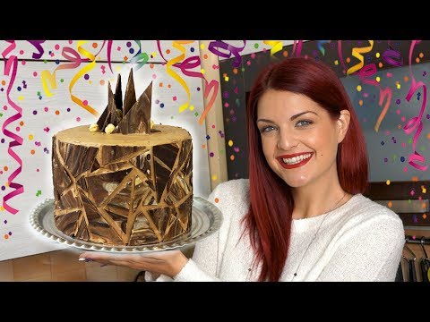 Видео: Лешникова торта с гланцирано масло от пралин и млечен шоколад