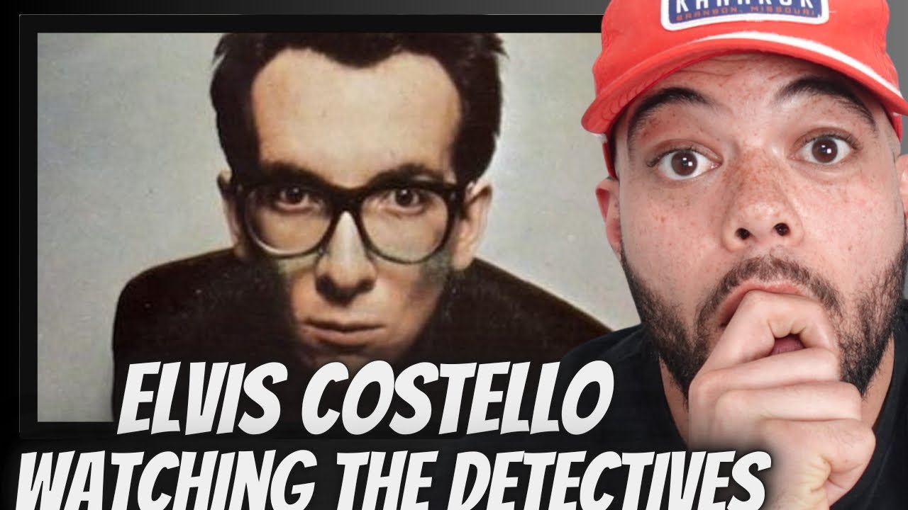 MYSTERIOUS!| FIRST TIME HEARING Elvis Costello -  Watching The Detectives REACTION