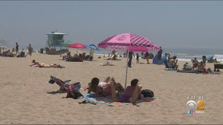 Coronavirus: Visitors Flock To Huntington Beach During Weekend Heat Wave