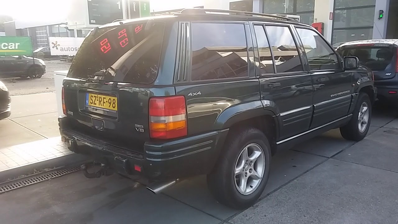 GREEN JEEP ZJ 5.9 V8 lopey cam idle. LOUD YouTube