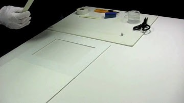 How to attach a mat to a backing board