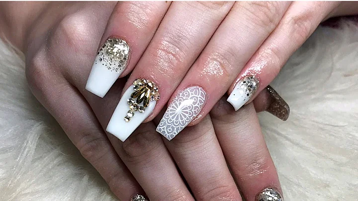 White and gold acrylic nails