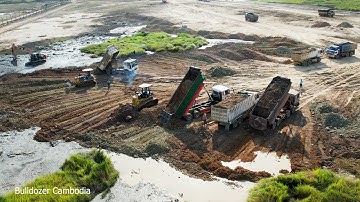 Incredible , Team Dump Truck Unloading Soil Work Fast And Two Dozer Kumat’su Pushing Soil Into Mud