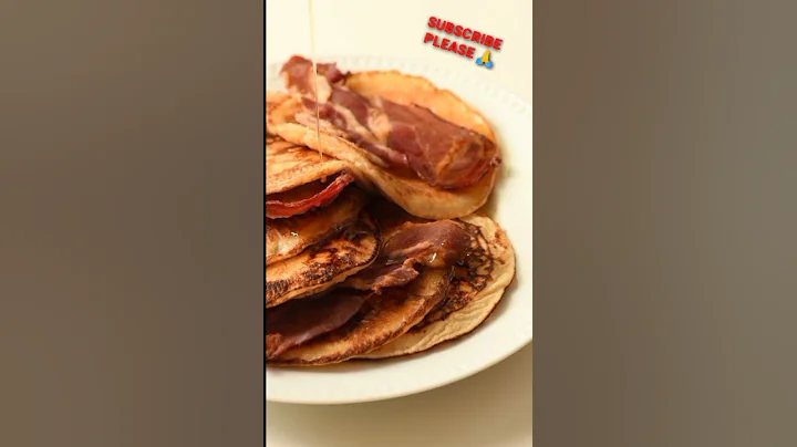 Pouring Maple Syrup on Bacon and Pancakes