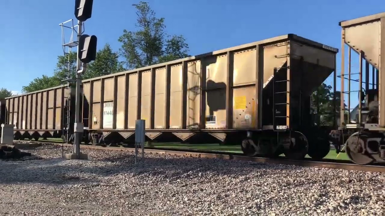 BNSF Coal Train with Kansas City southern locomotive and executive Grinstein locomotive.