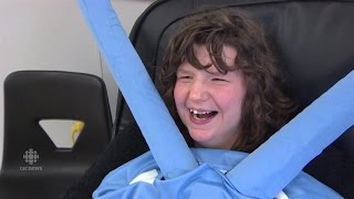 Blaine Bosley demonstrates the new squeeze chair to help special needs children Blaine Bosley demonstrates the new squeeze chair to help special needs children. To read more: http://www.cbc.ca/1.3313291 »»»