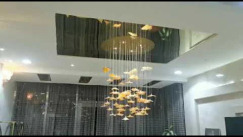 Golden INFINITO chandelier installation in Sultanate of Oman