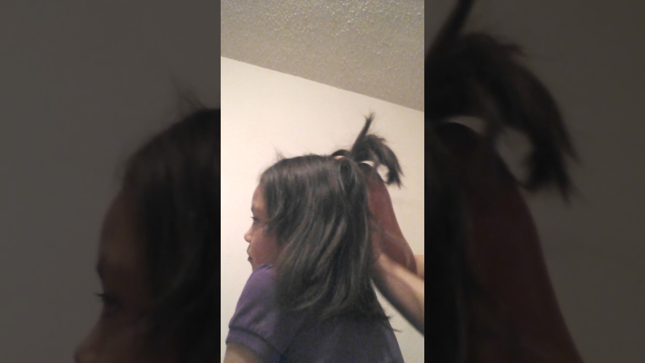 Doing my little sisters hair