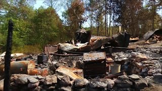 Family living out of tents after fire destroys family home