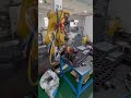 Handheld laser welding head on robot arm