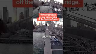 NYPD stops woman from jumping off the Brooklyn Bridge.