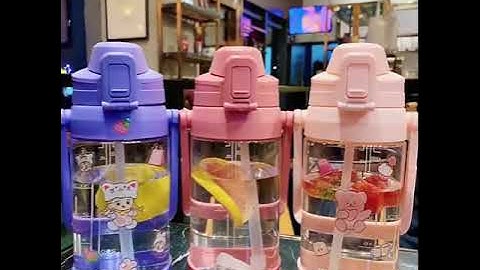 Bình Đựng Nước Dung Tích 1L  Có Ống Hút Quai Xách Kèm Miếng Dán Sticker