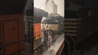 BNSF 6761 and Norfolk Southern 1181 lead a grain train