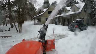 Snowblowing on a warm day.