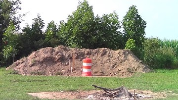 Blowing up caushion barrel with 1/2 pound of tannerite explosive