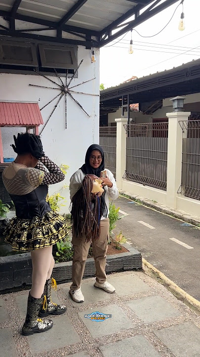 Sister Sulis takes a photo with the beautiful Miss Rika