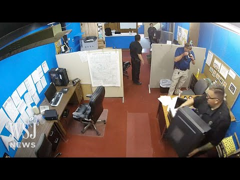 Watch: Police Raid