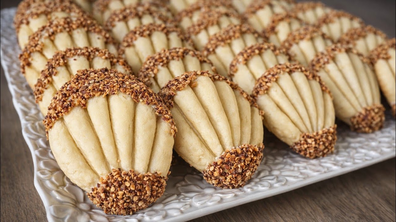 حلوة 10 دقائق بدون طابع ب بيضة واحدة مذاقها خطيييير هشيشة كذوب في الفم ساهلة ورائعة جدا مكونات بسيطة