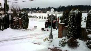 Plowing our road.