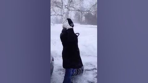 Polaris ranger plowing snow