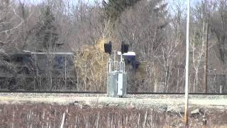 CSX Q018 Train Passes NS 92N Rock Dump Train