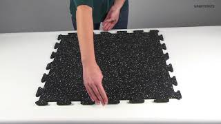 Shop Rubber Floor Tiles Now: https://www.greatmats.com/rubber-floor-tiles.php

This is our 8mm Thick Interlocking Rubber Tile.
Available in black or with color flecks, this lightweight & flexible recycled rubber floor tile is 2x2 feet in size and offers about 1/3 inch of impact absorption over hard flat surfaces. Among its best features are its easy connecting universal interlocking edges and amazing durability. It also has a slip & stain resistant surface that is easy to clean.

#GreatRubberFlooring