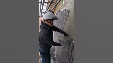 the technique of leveling the cement mixture for the wall #shorts