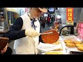 Korean traditional pancake - mung bean pancake made by a cool grandfather / Korean street food