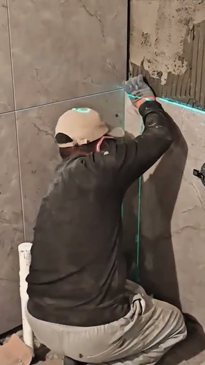 Download lagu Tiler Precision,Worker Installing Bathroom Tiles with Laser Guidance