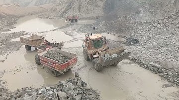 966E LOADER: THE ULTIMATE MOUNTAIN MACHINE FOR LOADING WORK"