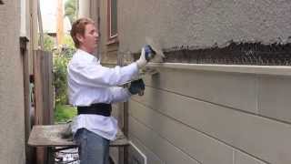 Match a stucco dash finish with heavy sand.