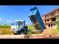 Tata dump truck unloading ￼ cut stone