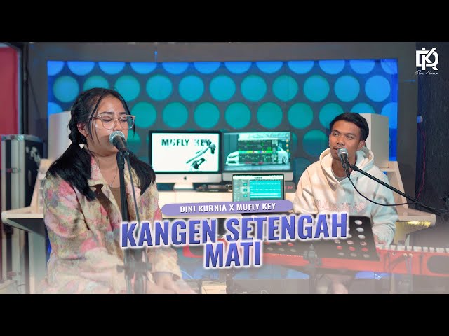 Dini Kurnia Ft Mufly Key  - Kangen Setengah Mati (Official Music Video) class=