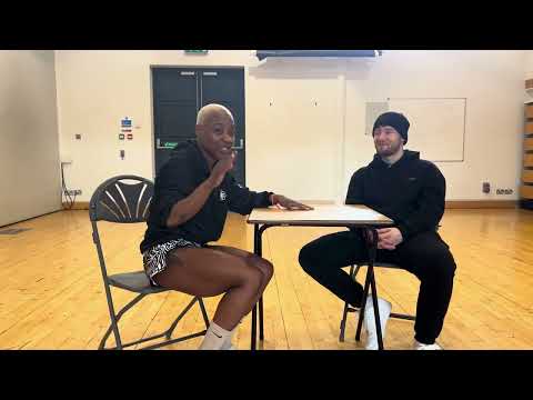 Female Muay Thai star Daniela Miranda speaking with LeapFrogs  Joe Turner