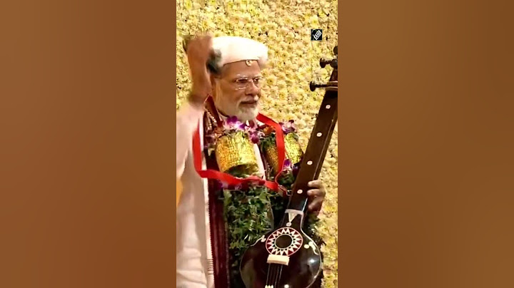 PM Modi tries his hand at musical instrument at Jagadguru Shrisant Tukaram Maharaj Temple