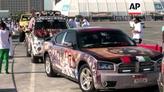 Hundreds of drivers take part in decorated car parade for National Day