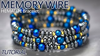 Stunning metallic blue iris finished hematite beads in a multi looped
memory wire beaded bracelet jewelry design with gold accents from
tierracast as well as...