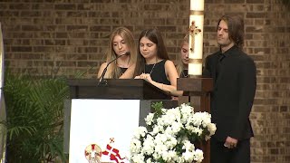 Children of fallen firefighter speak at funeral