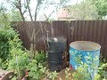 Самодельная автоматическая установка для наполнения бочек водой.