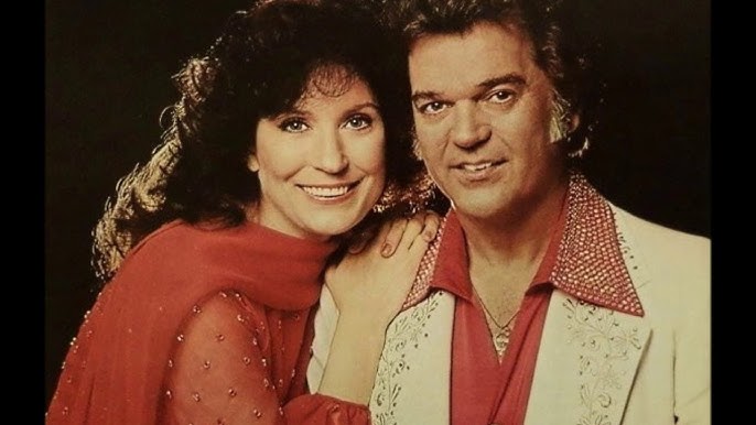 After The Fire Is Gone by Conway Twitty and Loretta Lynn from their album We Only Make Believe